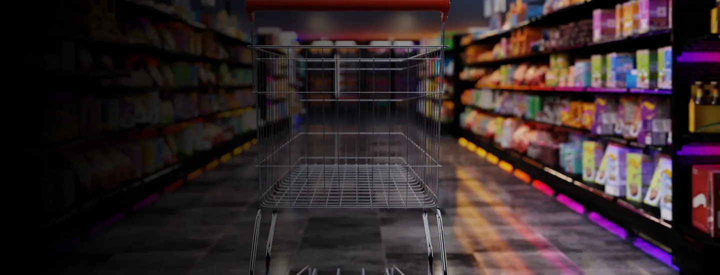 grocery aisle stocked with shelves and cart in center