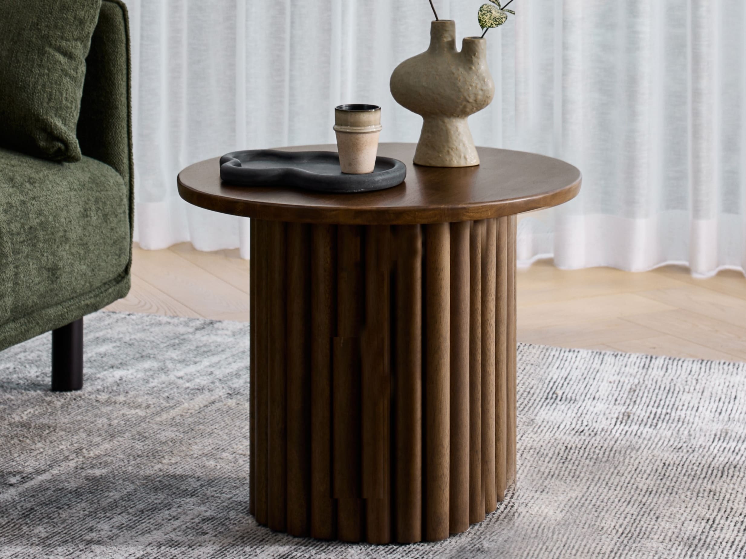 Photo of Jasper Round Side Table | Rustic Walnut Hardwood in a modern living room
