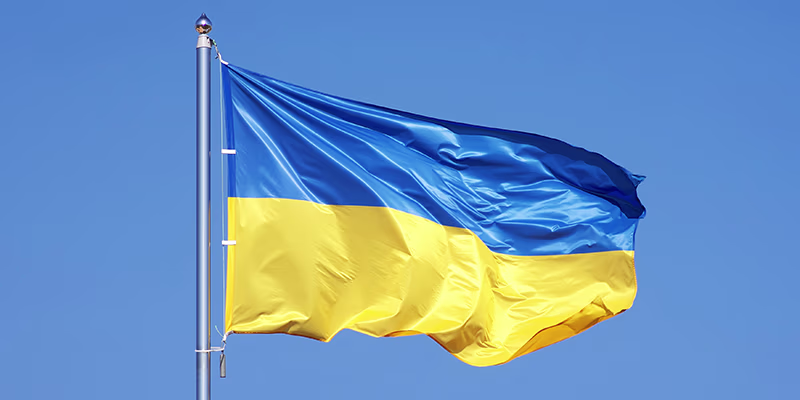 Ukrainian flag on blue sky backgroud