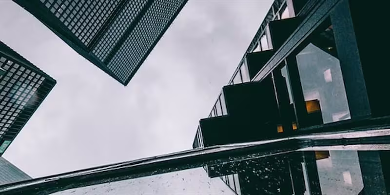 Ants eye view of skyscrapers on a grey sky