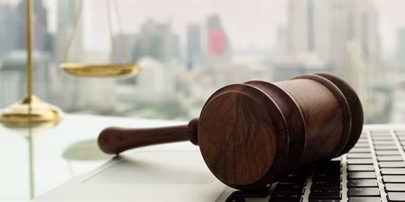 Gavel resting on keyboard