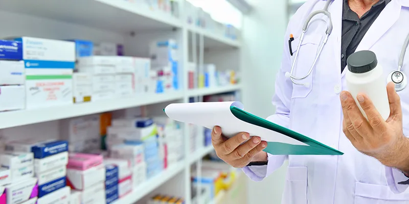Pharmacist filling prescription