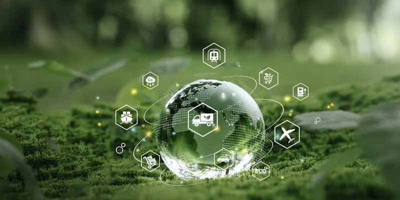 Glass globe in the moss on the forest floor surrounded by white icons relating tot he environment