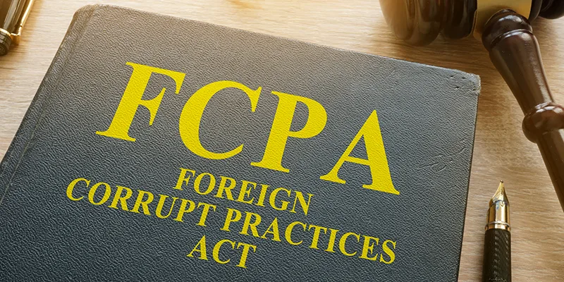 FCPA Foreign Corrupt Practices Act on a desk.