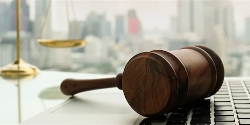 Gavel resting on keyboard