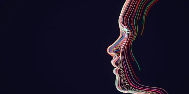 Face drawn with colorful lines against a black backgrounds