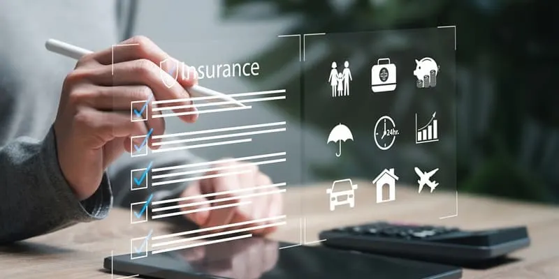 Hand writing on see-through futuristic screen with icons